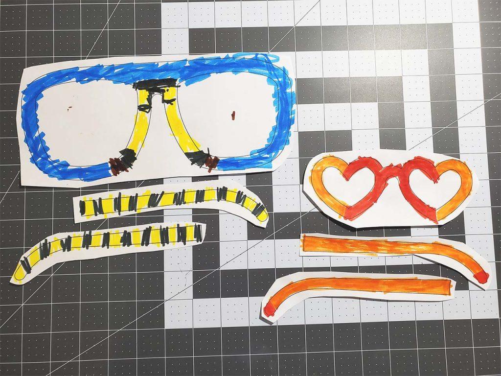 Cut the glasses pieces with a little bit of paper around the edges