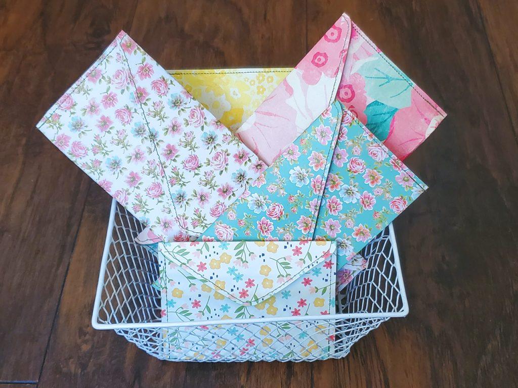 basket of sewn paper envelopes